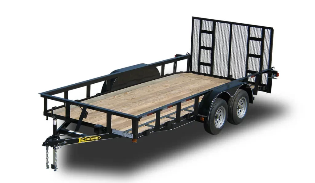 This equipment hauler is used for the blog, "What is a utility trailer used for?" and shows the wood-paneled floor of a standard model trailer.