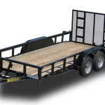 This equipment hauler is used for the blog, "What is a utility trailer used for?" and shows the wood-paneled floor of a standard model trailer.