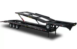 A double-deck 4 car hauler trailer is pictured here. It is the best car for your needs for transporting multiple cars at once. 
